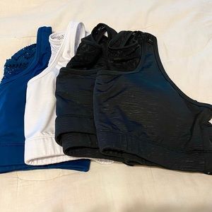 Bomber sports bras
2 black
1 white (no pads)
1 teal 
EUC